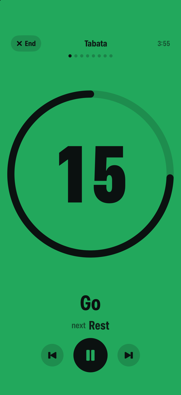The timer mid workout: the whole screen is green for Go, with a large 15 second countdown inside a ring